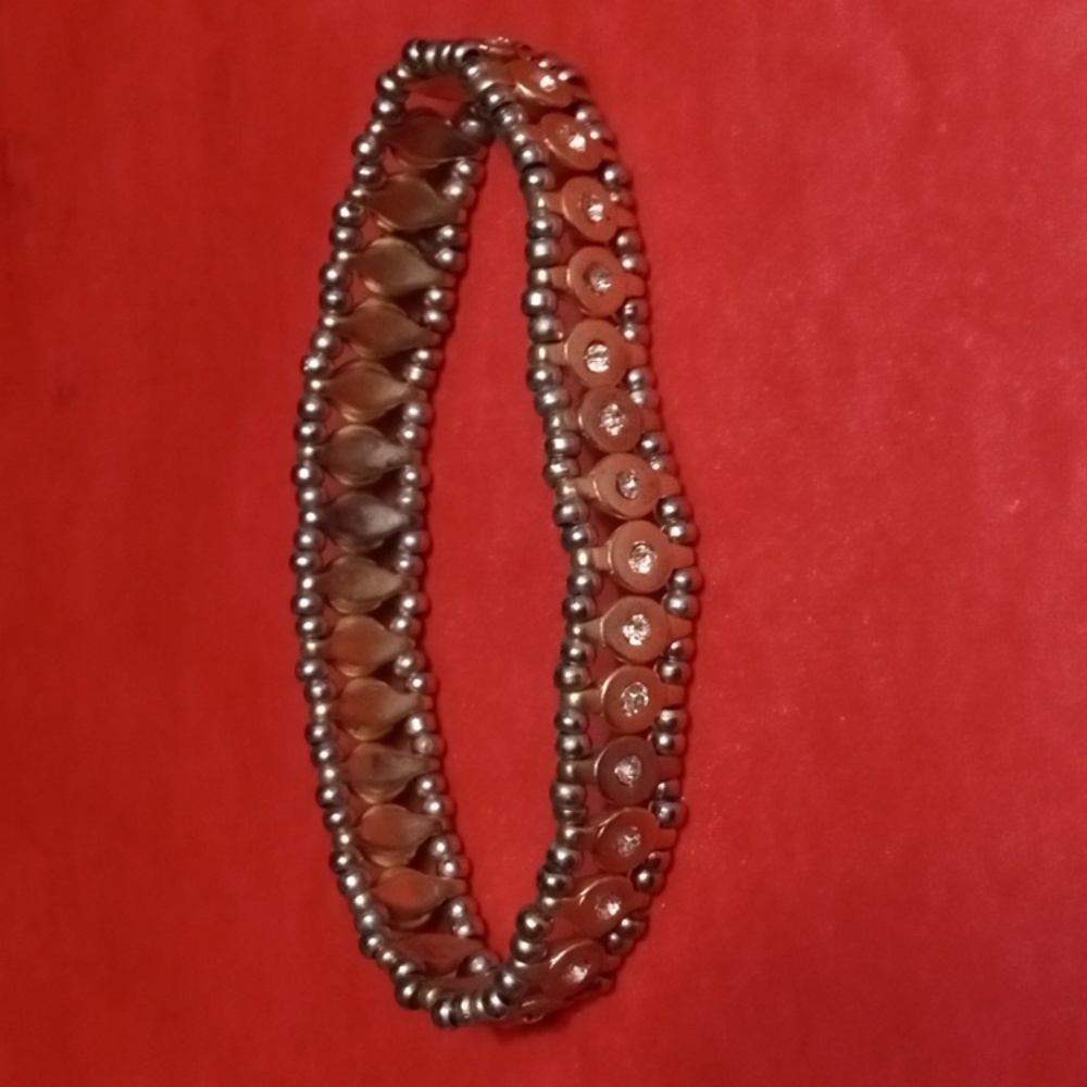 White rhinestone gold tone 7 " bracelet. (Sku 118)